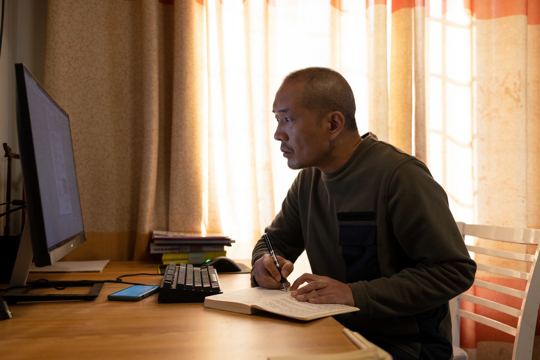 Faculty editor at desk