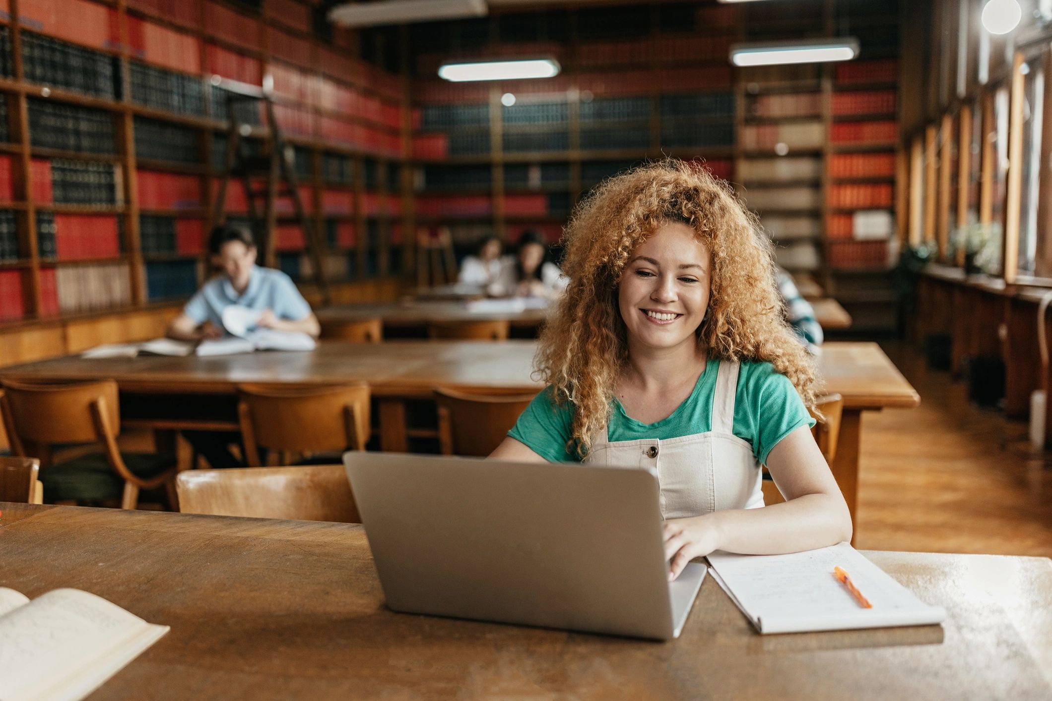 Student studying online with a laptop