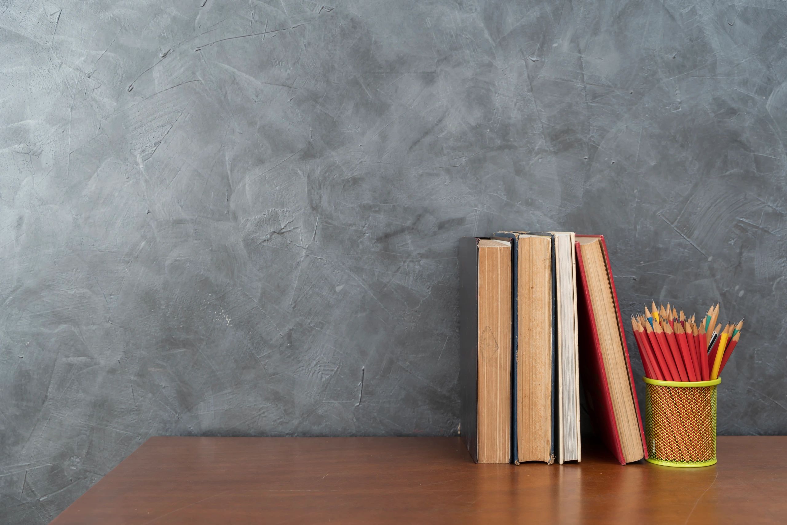 Books on desk representing structured theological study